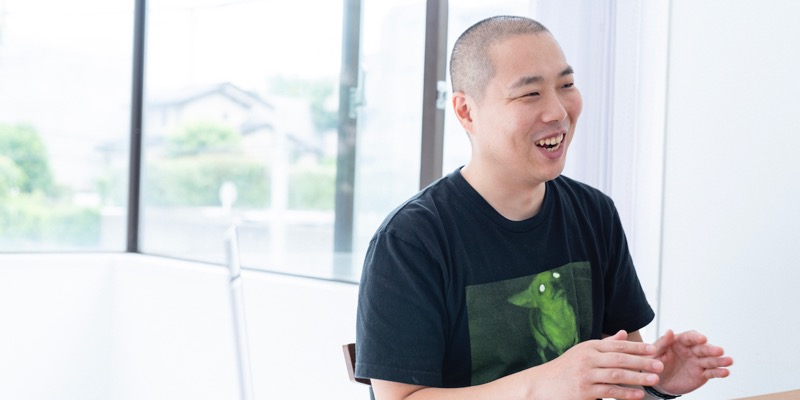 WEBディレクター兼デザイナーの中込啓士さん。Mo-Greenの強みを聞くと、「須藤と三浦のツートップが強すぎますね。勉強になります」と笑顔を見せた