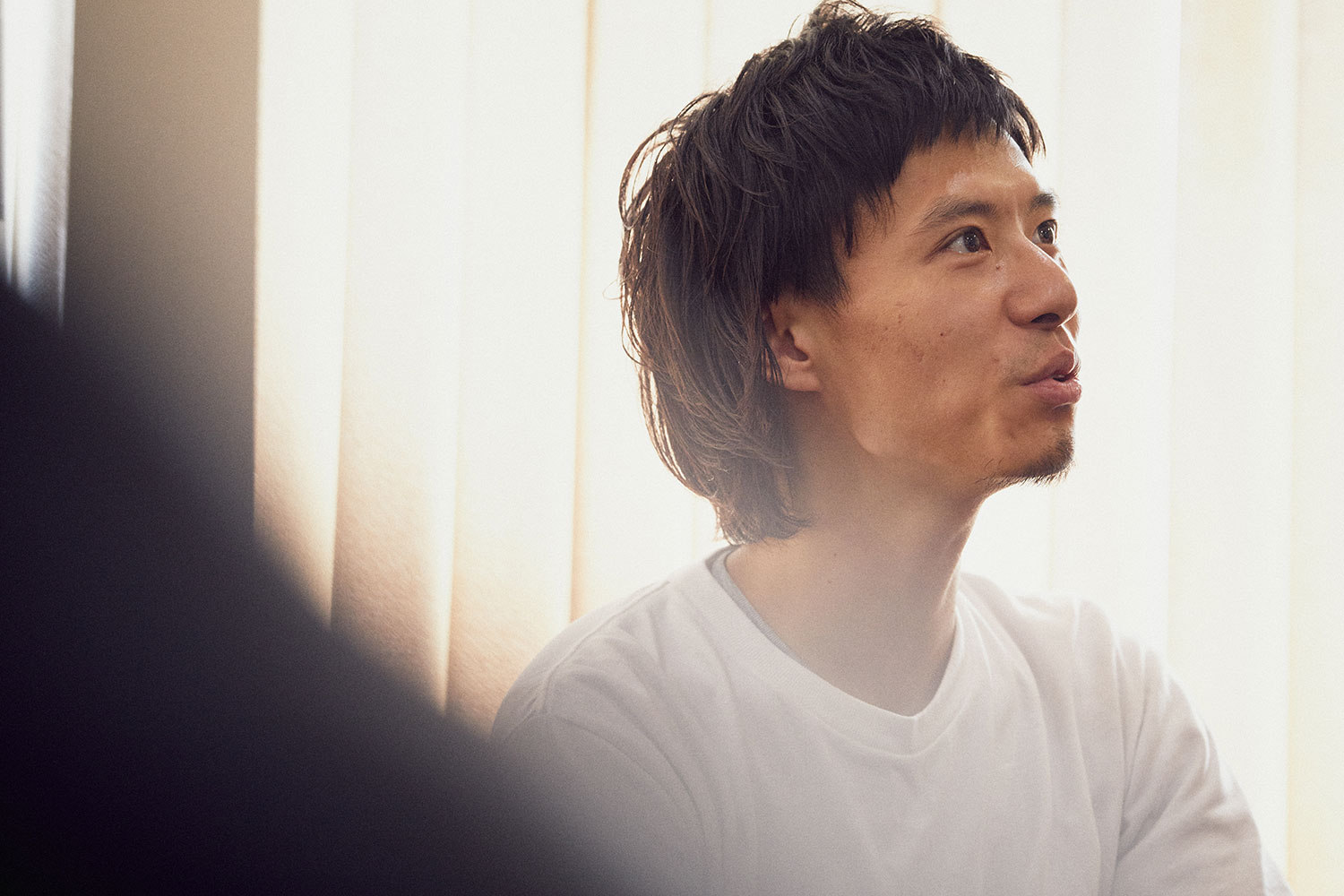 株式会社BABEL LABEL プロデューサーの金永治さん。入社は2018年だが、BABEL LABELメンバーとは旧知の間柄。「売上や利益ではなく、それぞれが何かを成し遂げるために集まっている。そこがほかの会社とのいちばんの違いです」
